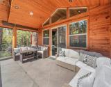 Covered Front Balcony with Multiple Seating Options