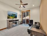 Mid level Den with sofa sleeper and electric fireplace