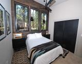 Queen Bedroom with Wall Mounted TV