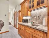 Custom cabinets and kitchenette with microwave - Theatre Room